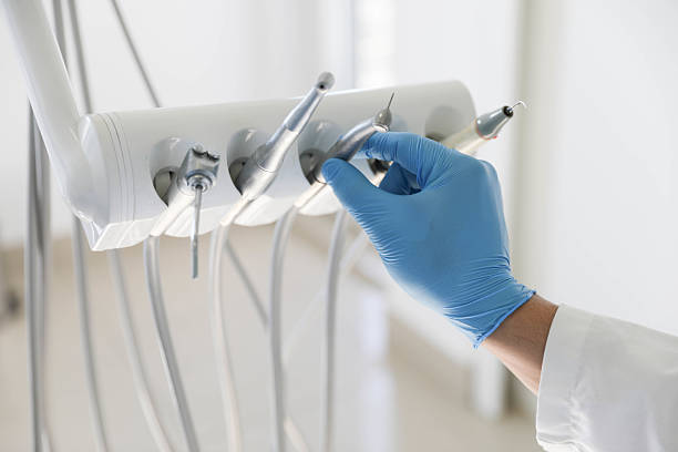 Professional Tooth Extraction technician working in Maysville, NC